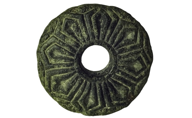 Irgoli, Antiquarium comunale. Fusaiola litica decorata