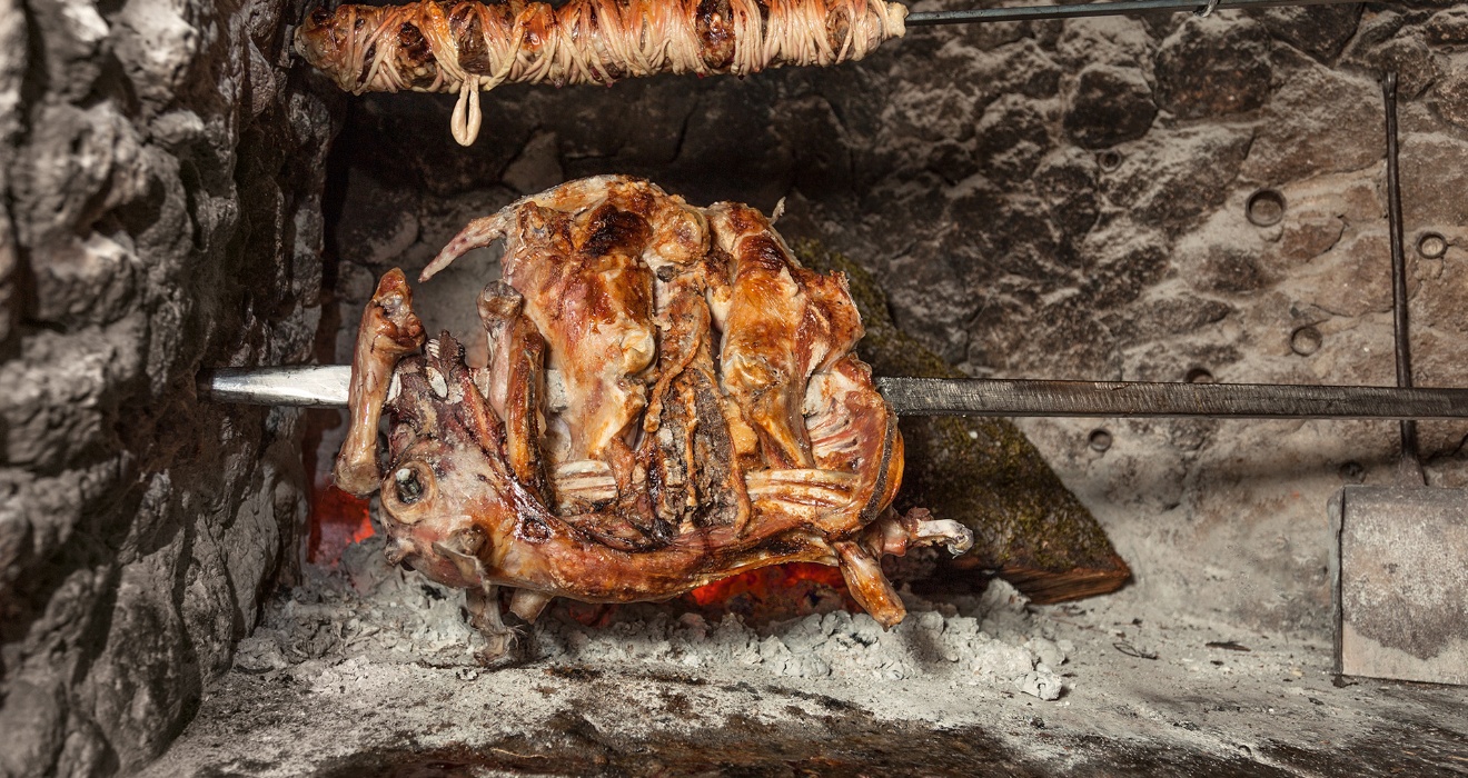 Skewer of offal and suckling goat on the spit